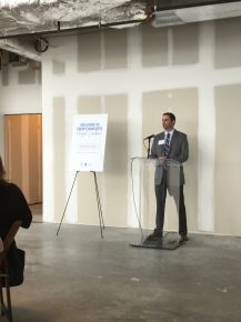 John Ball, senior leasing agent with Trinity Partners, spoke to the crowd for the CREW luncheon. Photo by Scott Baughman